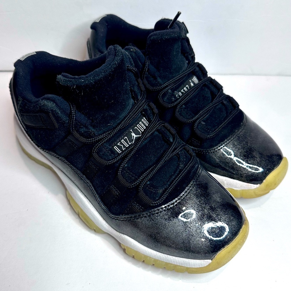 Kids Black and White Jordan 11 Sneakers - Picture 1 of 8